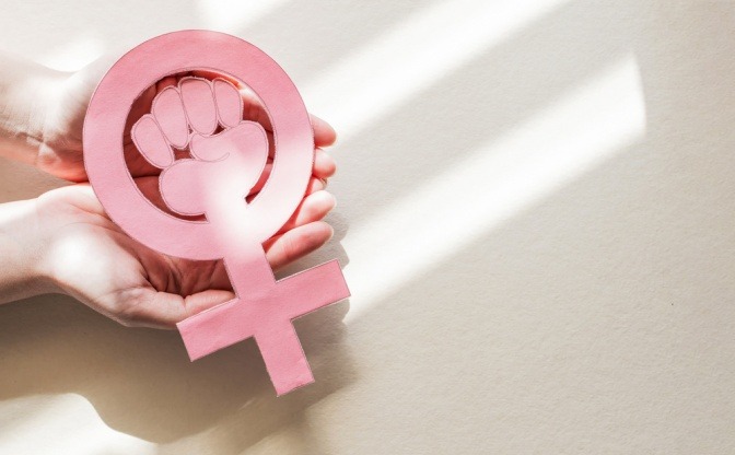 Symbol für Frau und eine starke Faust