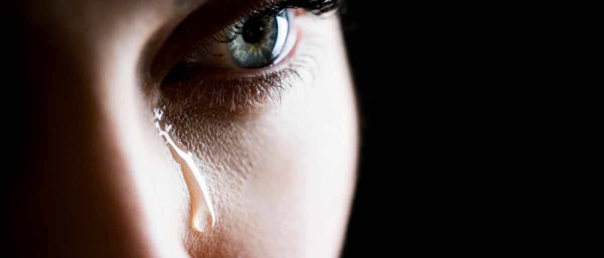 Das Gesicht einer weinenden Frau